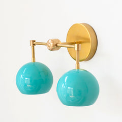 Aqua blue and brass two light mid century  modern wall sconce