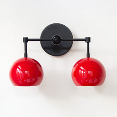 red and black two light mid century modern wall sconce