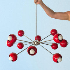 Red and Chrome Sputnik Style Chandelier with a mid century modern style shape.  Statement dining room light with a pop of color