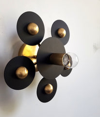 black and brass modern geometric circle sconce or flusmount fixture small glass lightbulb