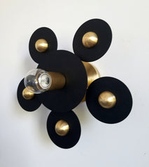 black and brass modern geometric circle sconce or flusmount fixture