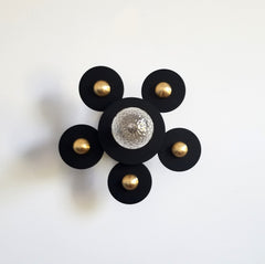 black and brass modern geometric circle sconce or flusmount fixture crystal cut bulb