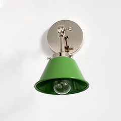 Green and chrome adjustable wall sconce for open shelving with midcentury modern colors and a small cone shade
