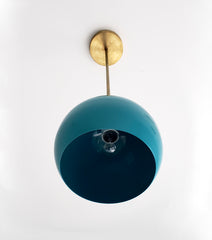 Brass and Teal midcentury modern inspired kitchen pendant lighting with a large globe shade