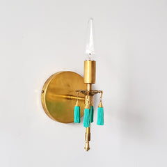 Modern Victorian candelabra wall sconce in brass with turquoise beaded tassels