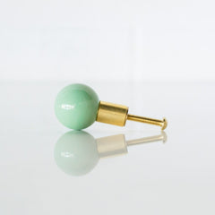 Pastel Green and brass ball drawer pull or cabinet knob hardware.  Perfect pop of color for kitchen cabinets, bathroom vanity, and more.