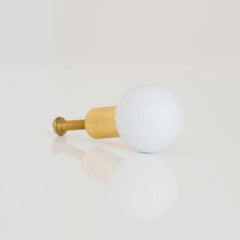 White and Brass gumball inspired cabinet and drawer pull made by Sazerac Stitches