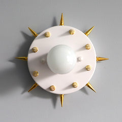 White and gold punk rock sconce