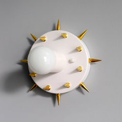 White and gold spiked modern sconce