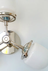 chrome sconce or ceiling fixture