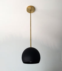 brass and black pendant globe lighting perfect for kitchen island pendants modern