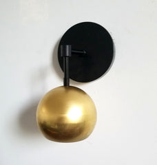 black and brass gold wall sconce modern art deco mid century modern luxury lighting wall sconce beside lamp
