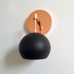 black and copper single light sconce modern midcentury inspired decor vanity light wall fixture task lighting matte black fixture