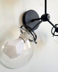 black and clear 3 light wall fixture modern