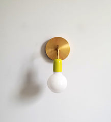 brass and chartreuse neon yellow single modern wall sconce bathroom lighting fixture