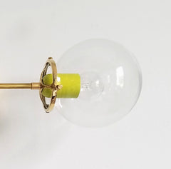 brass and neon yellow midcentury globe glass chandelier