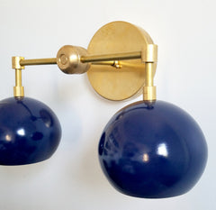brass and navy nautical wall sconce