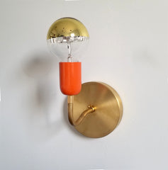 brass and orange modern curved wall sconce bathroom lighting midcentury