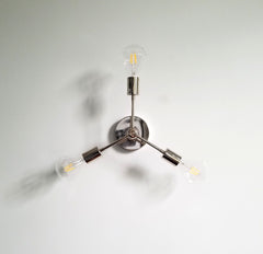 wall sconce or flushmount lighting midcentury modern style sputnik