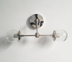 Chrome and clear two light wall sconce