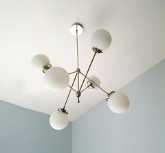 chrome and white glass angled mid century styled chandelier ceiling light fixture modern design home renovation