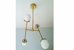 minimalist modern brass lighting with glass chandelier