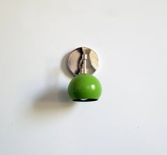 chrome and green bathroom wall sconce