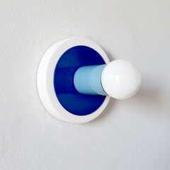 blue and white popart wall sconce or flush mount ceiling light that is cute for colorful decor