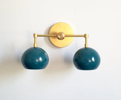 teal and brass two light bathroom vanity fixture modern