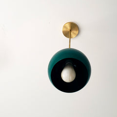 Brass and jewel tone green globe pendant lighting