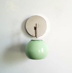 mint and chrome eyeball shade wall sconce vanity lighting midcentury inspired with a floral cap