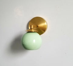 mint and brass moden mid century inspired wall sconce lighting colorful home decor