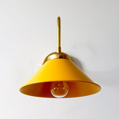 mustard and brass modern wall sconce is perfect for kitchen renovations, bathrooms, etc.