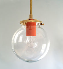 Brass and orange pendant light clear glass