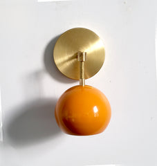 brass and orange mid century modern wall sconce accent lighting
