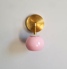 Pink and brass daisy loa sconce