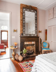 Old new Orleans home with barss wall sconces with tassels