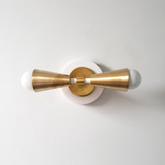 white and brass art deco inspired 2 light wall lighting for bathrooms or accent lighting