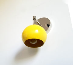 chrome and yellow globe shade lighting