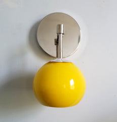 Yellow and chrome single daisy loa sconce midcentury modern feminine floral wall sconce lighting nursery and childrens bedroom decor colorful light fixture